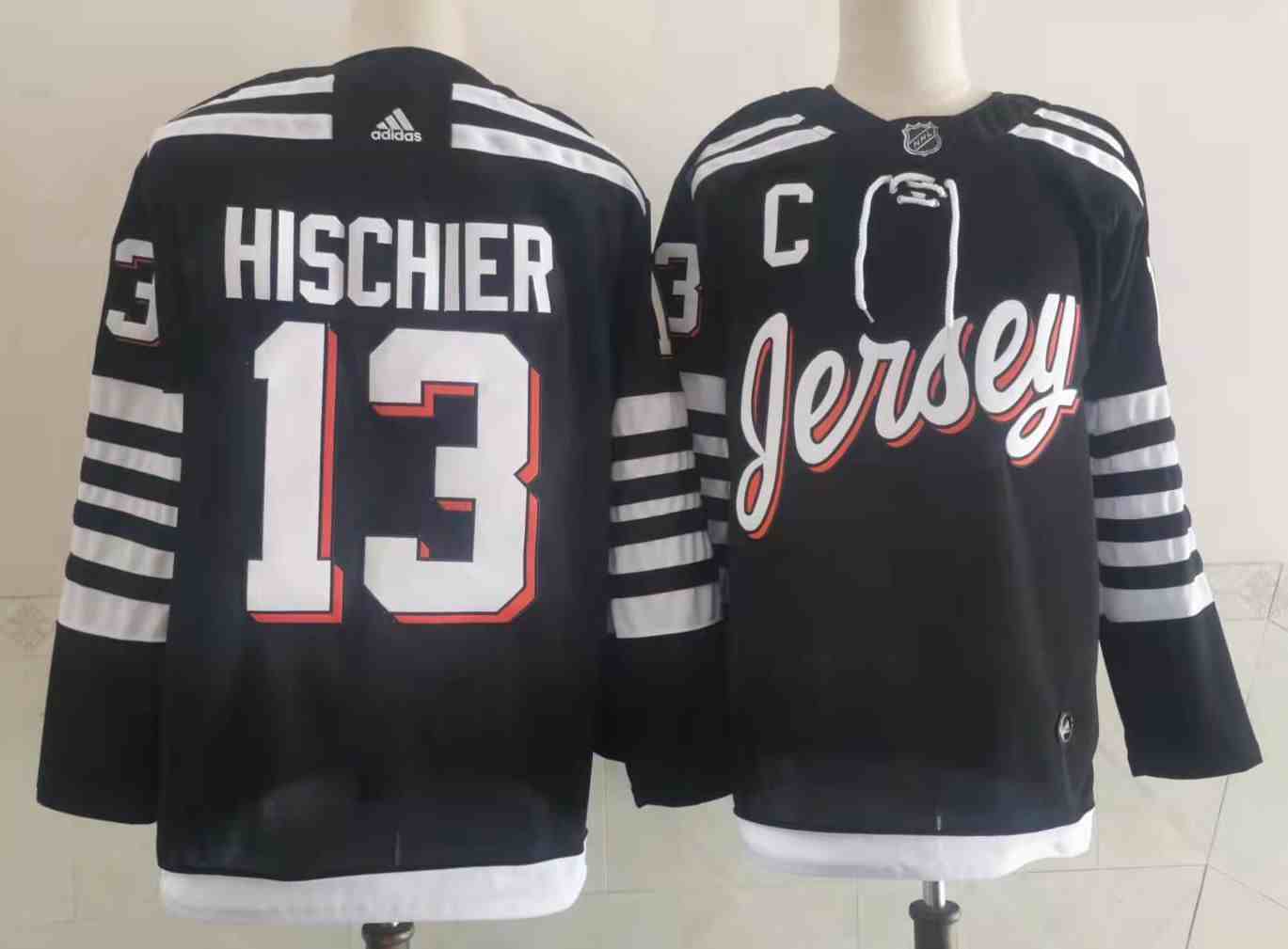 2022 New Jersey Devils new uniform makes on-ice debut Men's New Jersey Devils #13 Nico Hischier Black Alternate Authentic Jersey